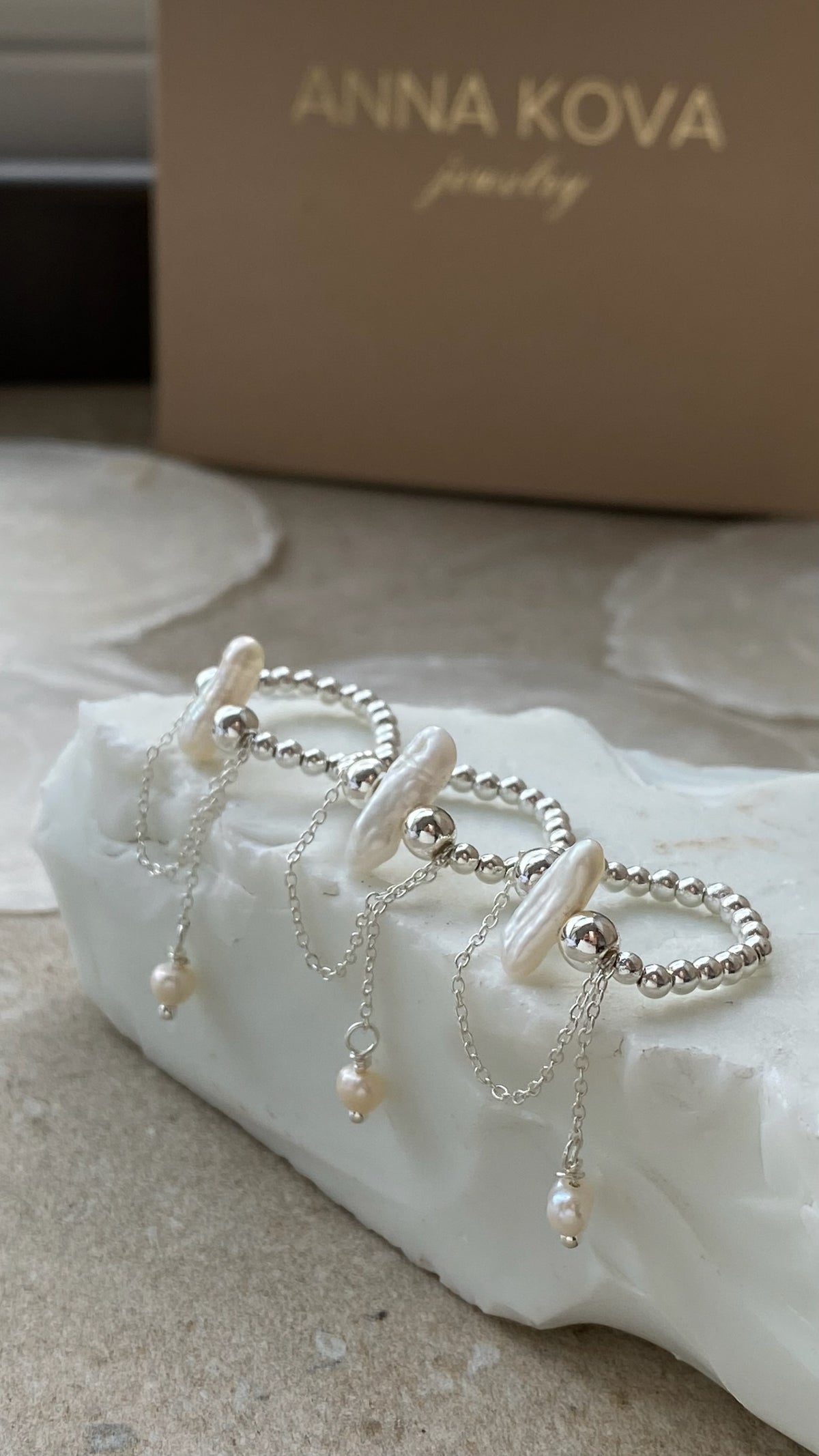 Kasei sterling silver ring with a natural baroque pearl and silver chains