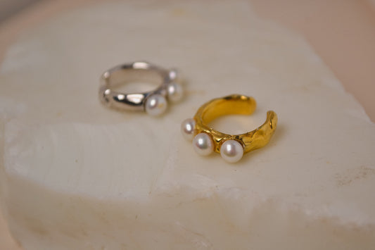 WAVES sculptural silver ear cuff with a wave-like surface and three natural pearls