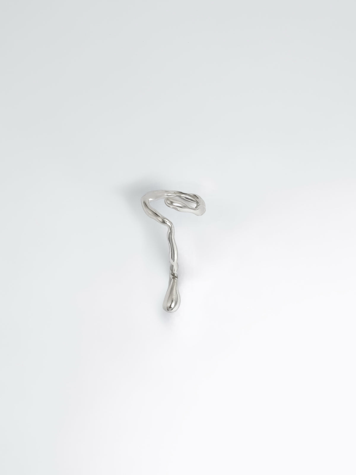 modern nail ring silver on hand water aesthetic jewelry close up