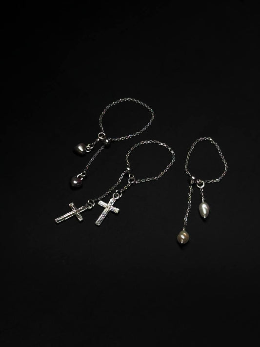 Nicole adjustable sterling silver ring with two decorative charms