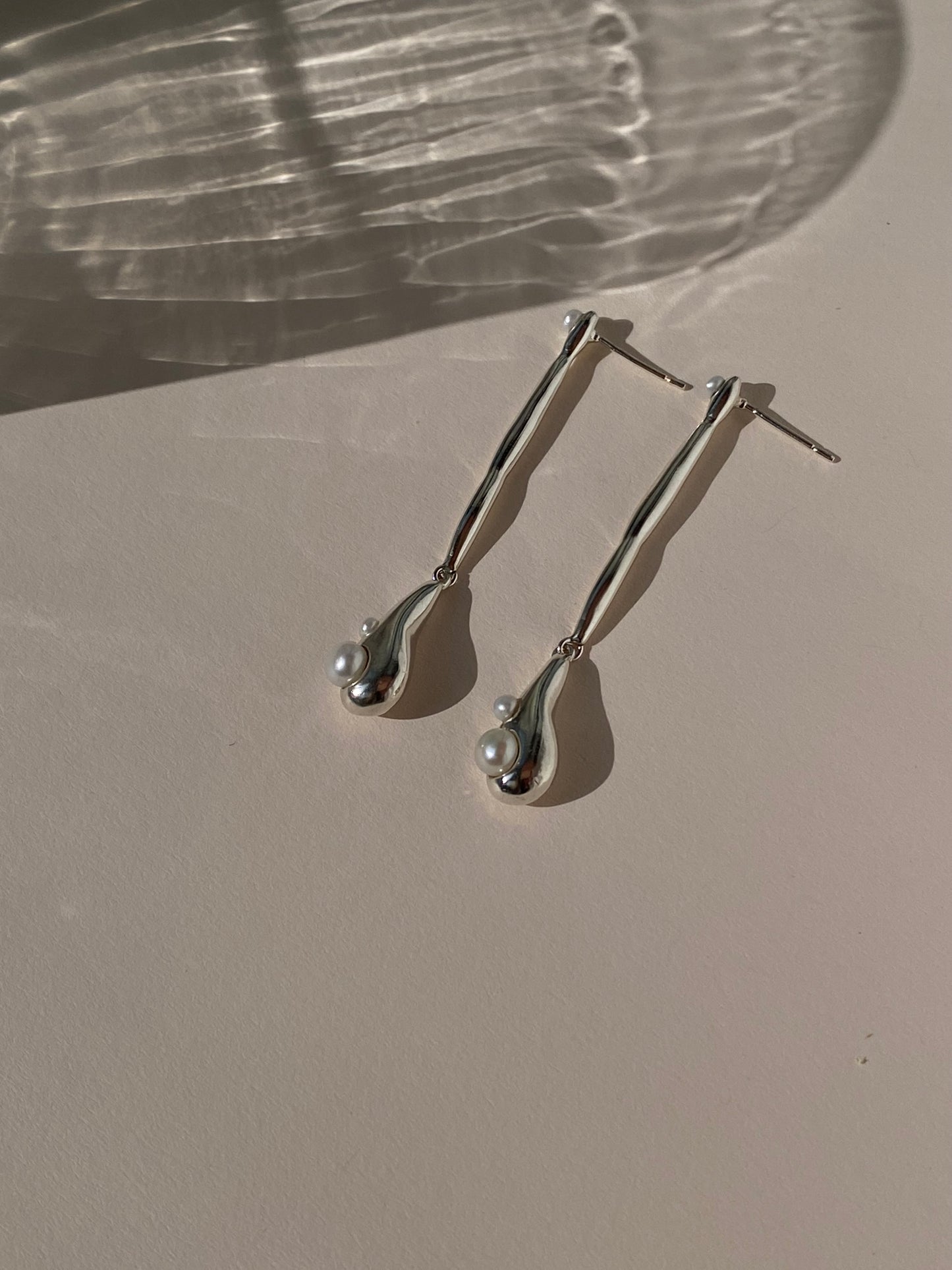 “Quiet water”  sterling silver sculptural drop earrings with pearls