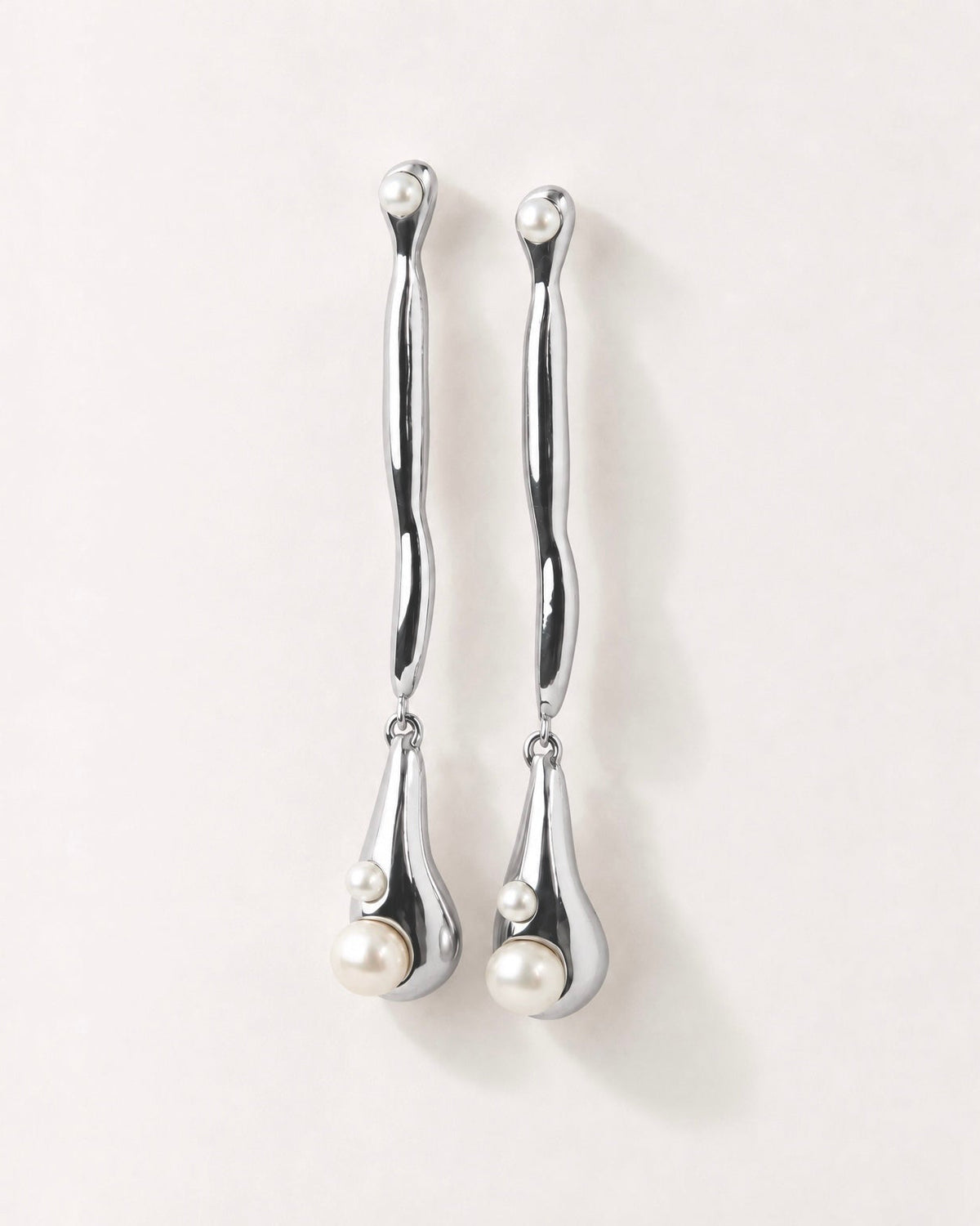 “Quiet water”  sterling silver sculptural drop earrings with pearls