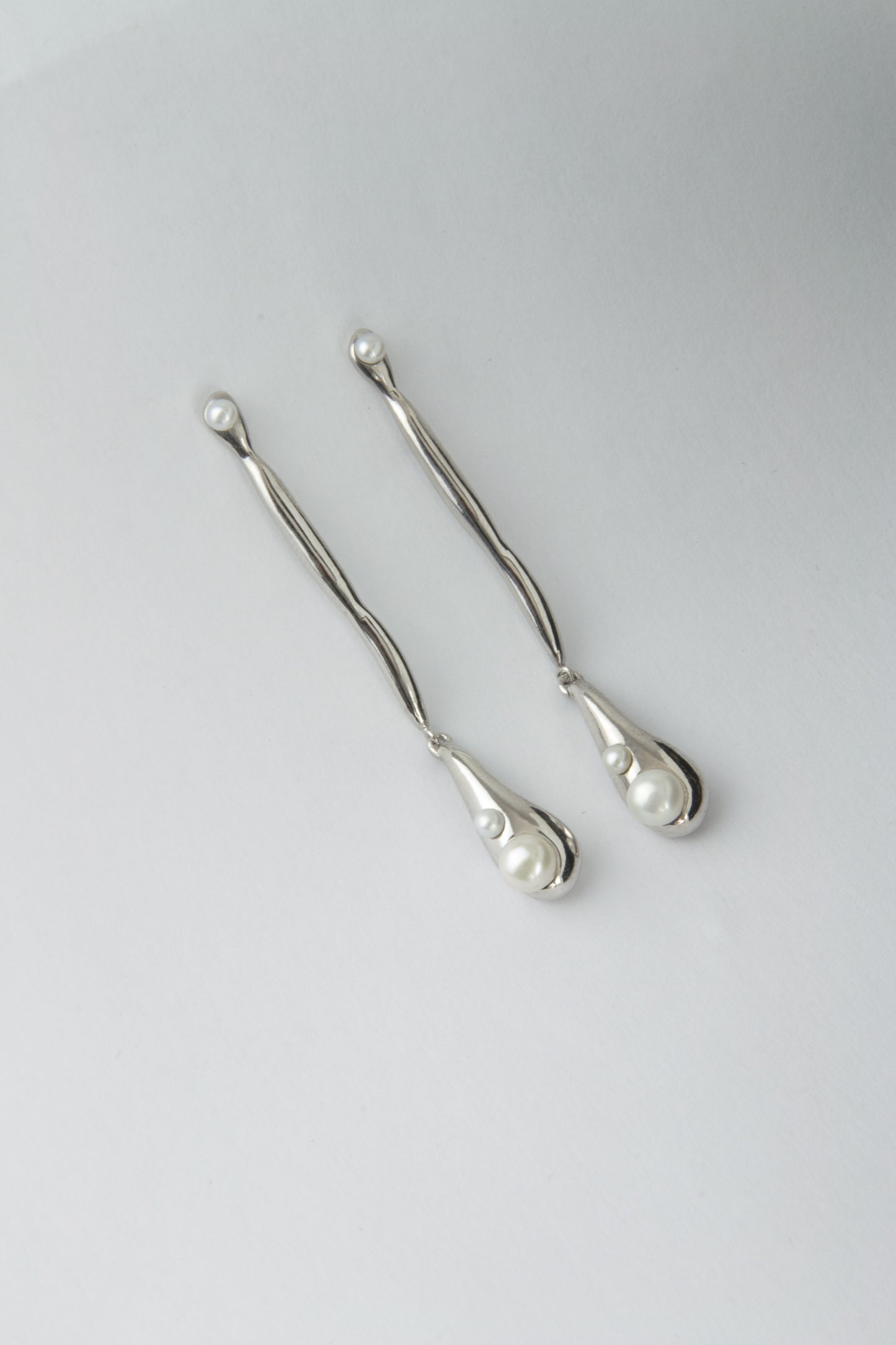 “Quiet water”  sterling silver sculptural drop earrings with pearls