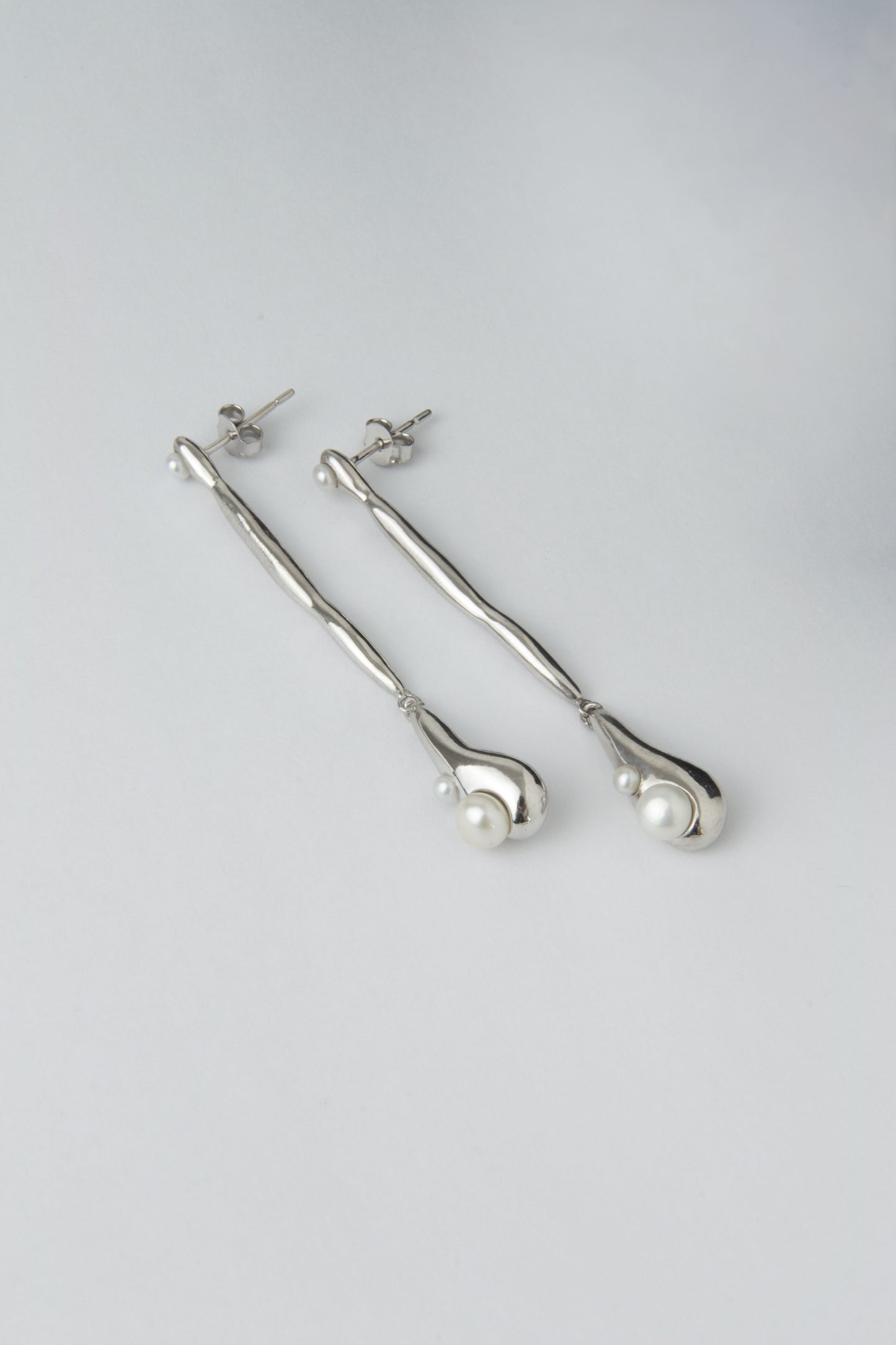 “Quiet water”  sterling silver sculptural drop earrings with pearls