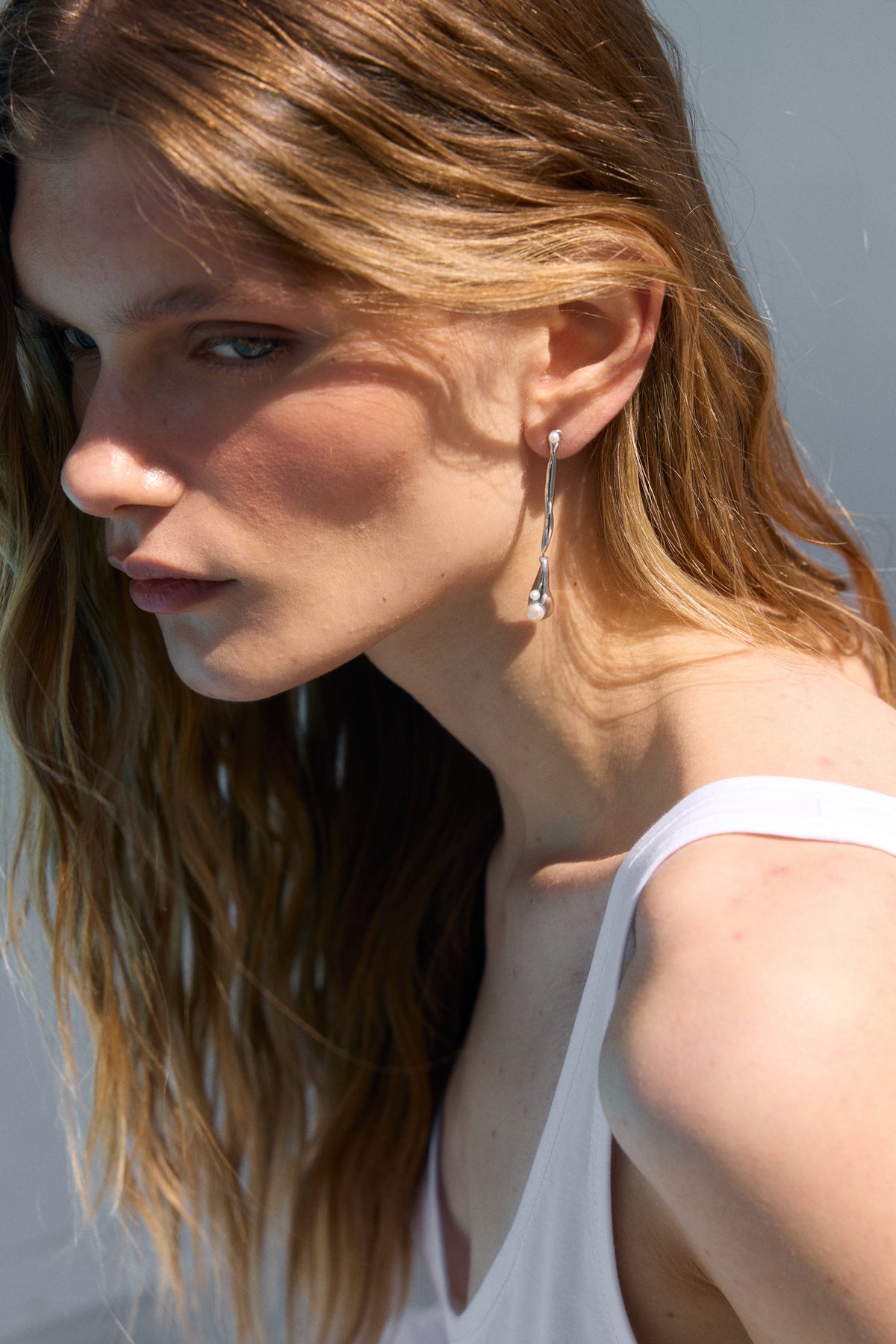 “Quiet water”  sterling silver sculptural drop earrings with pearls