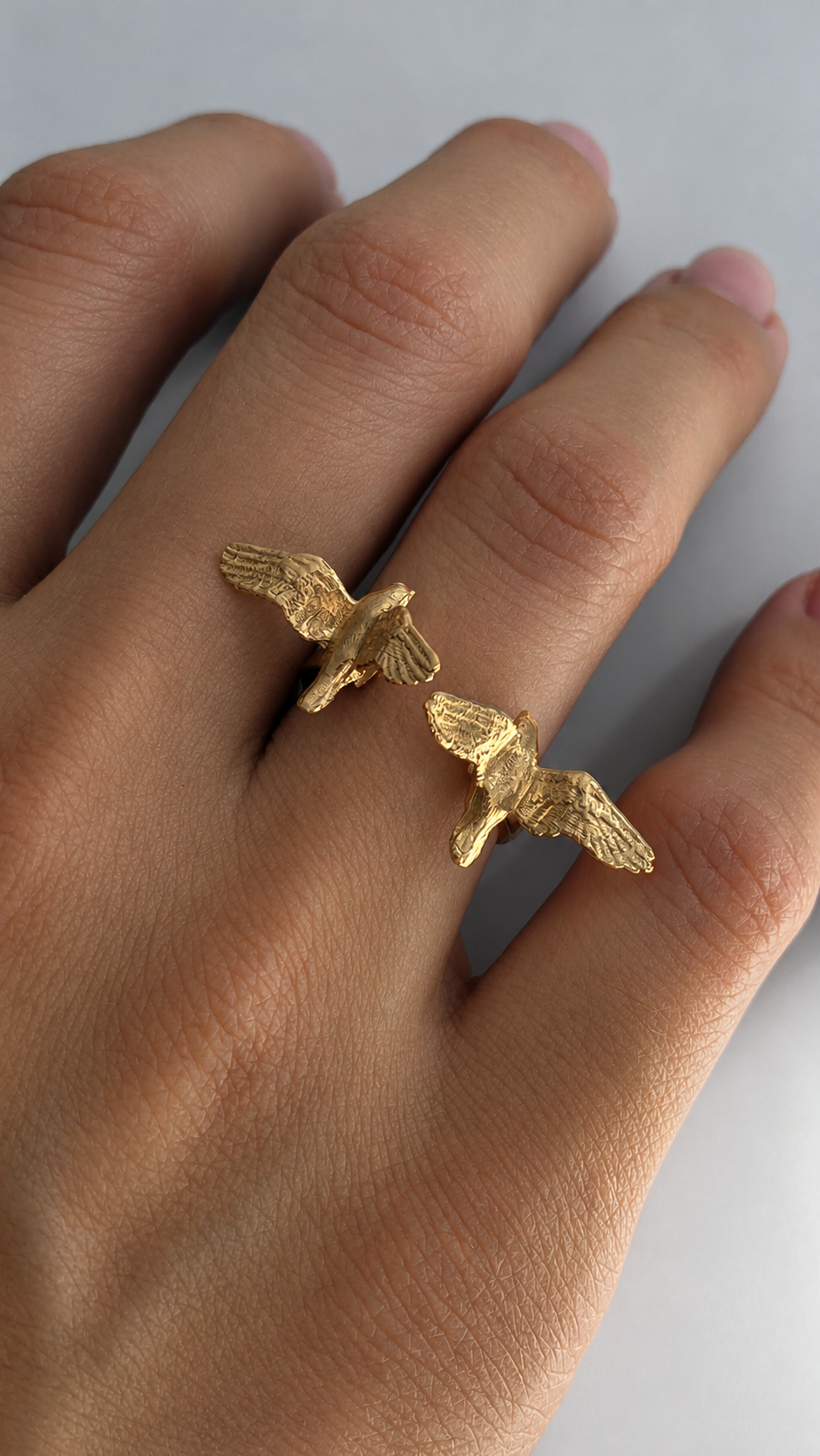 AILES Grand 24K gold-plated sterling silver ring with two sculpted birds in flight