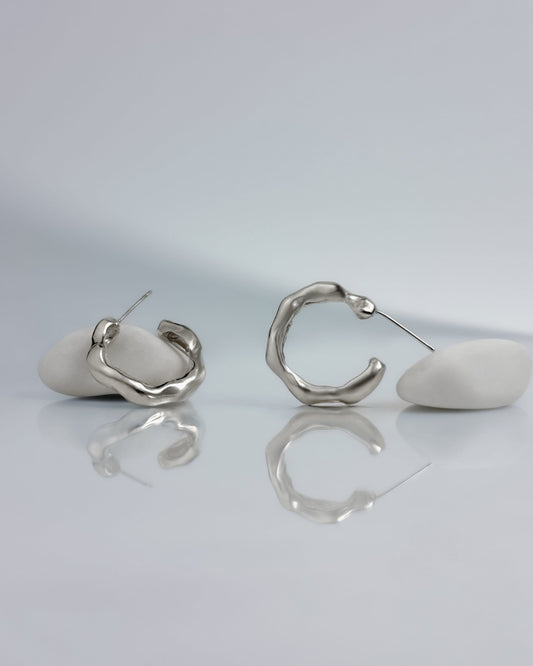 sterling silver fluid hoop earrings minimal product photo