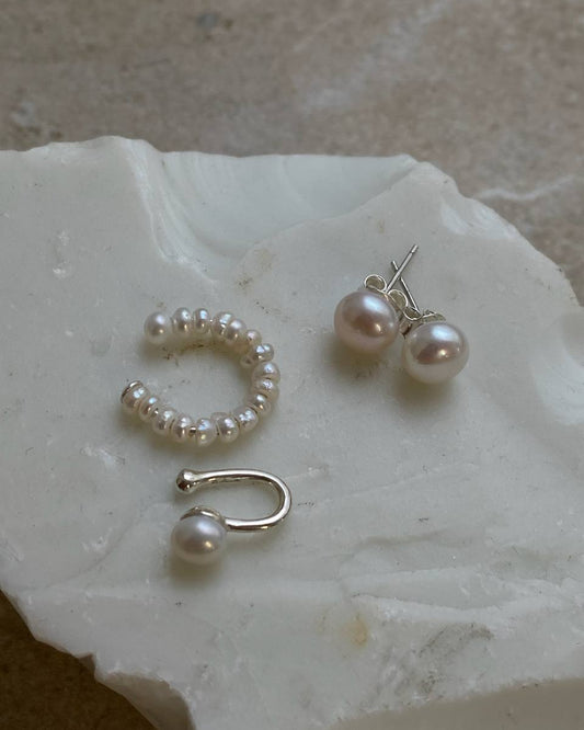 Pearl stud earrings and two pearl ear cuffs in silver with natural pearls