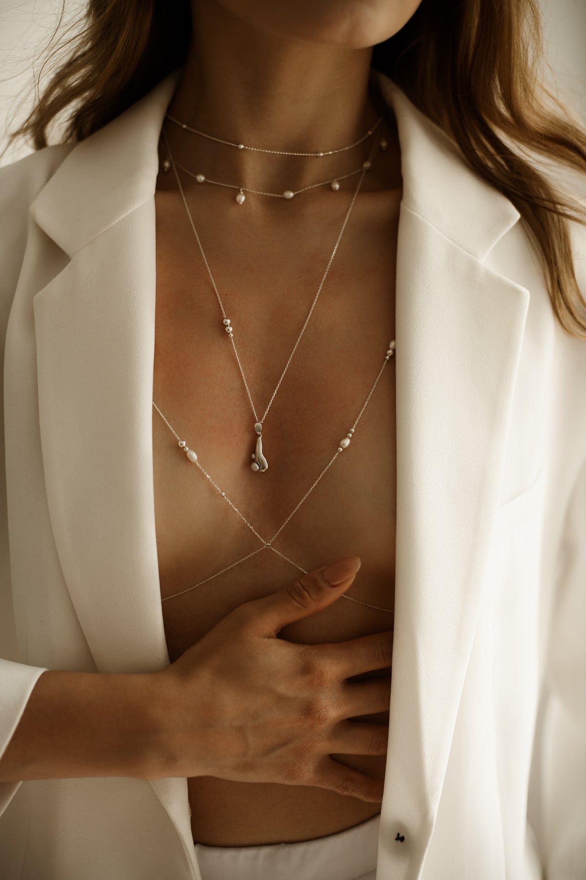 Tear Drop pendant necklace with rhodium plated sterling silver and natural pearls