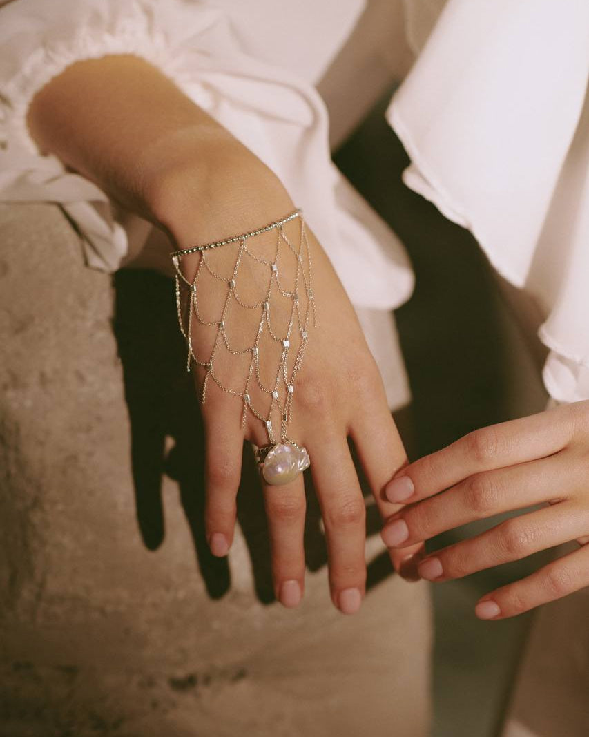 MEDINA woven silver bracelet with 925 sterling silver beads and chain detailing