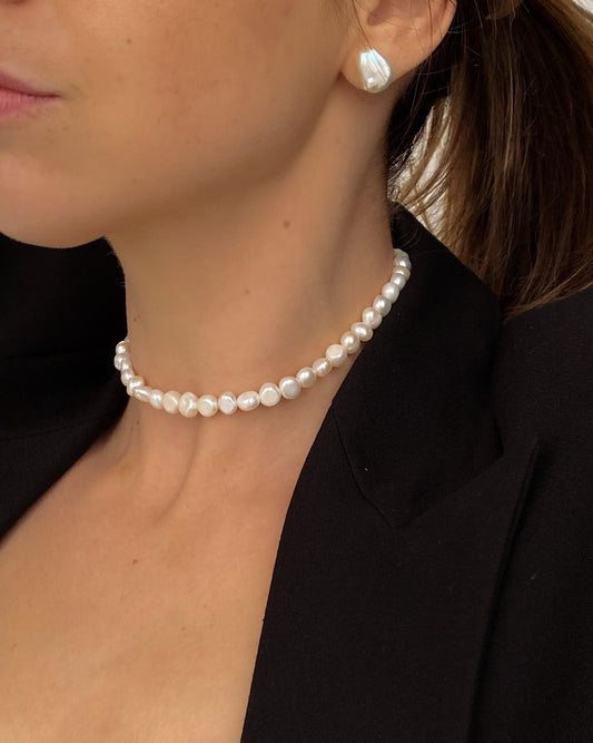 Freshwater pearl choker featuring 5–7 mm freeform pearls and silver hardware