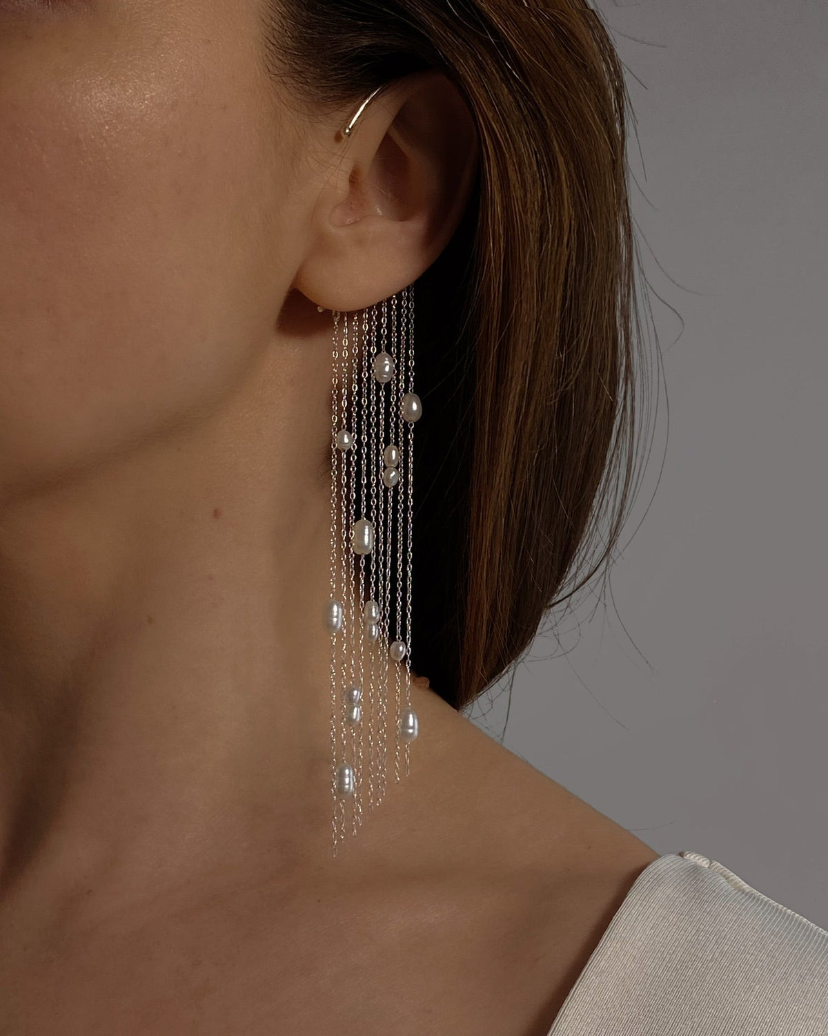 Malta sterling silver ear cuff with a cascade of natural pearls