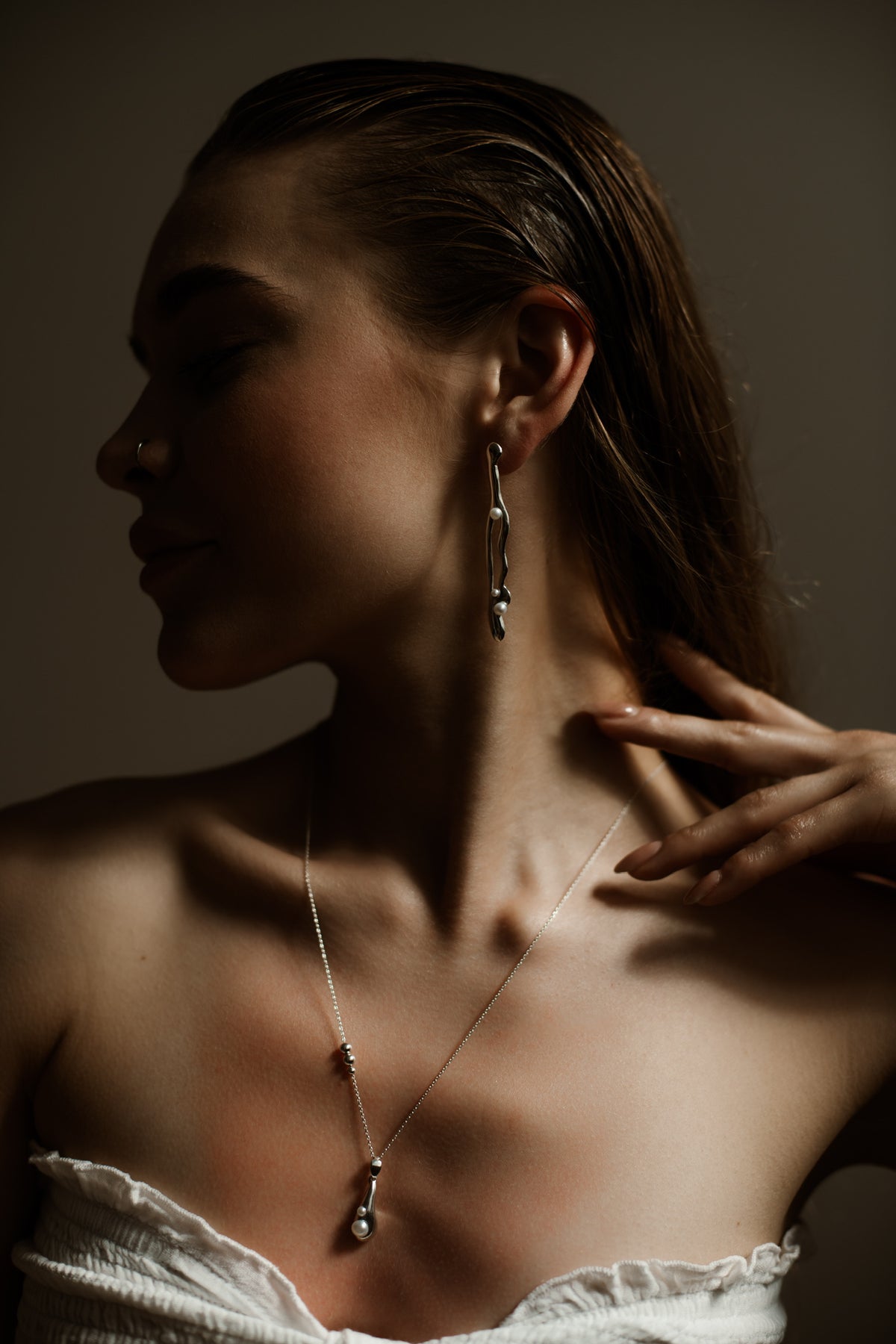 Tear Drop silver pearl pendant necklace with a decorative beaded chain
