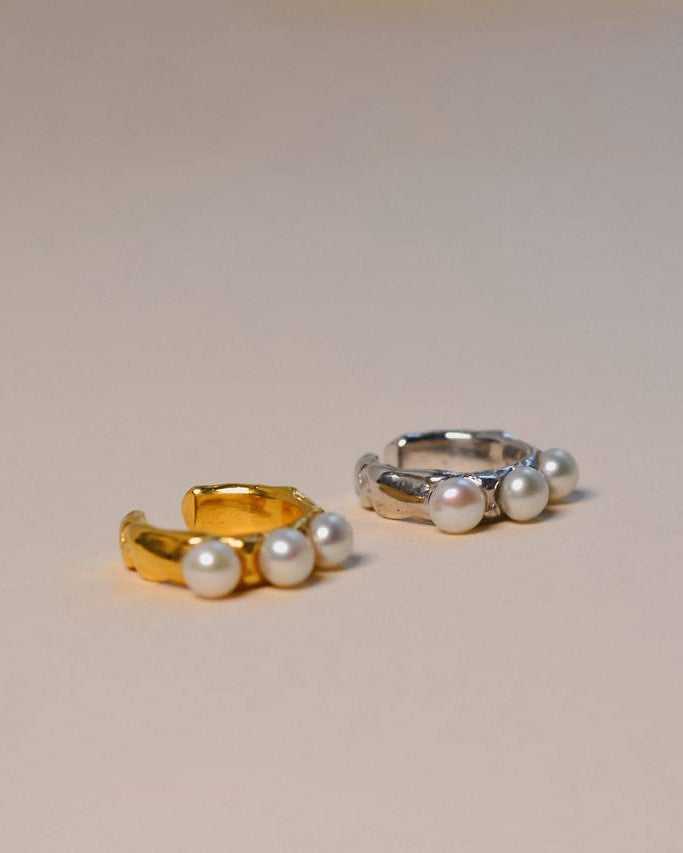 WAVES sculptural silver ear cuff with a wave-like surface and three natural pearls