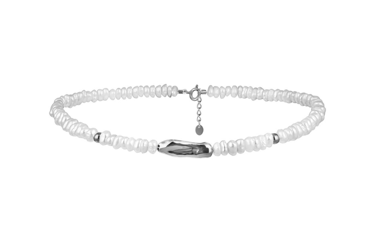 Eclat #2 pearl choker with a polished rhodium-plated silver centerpiece