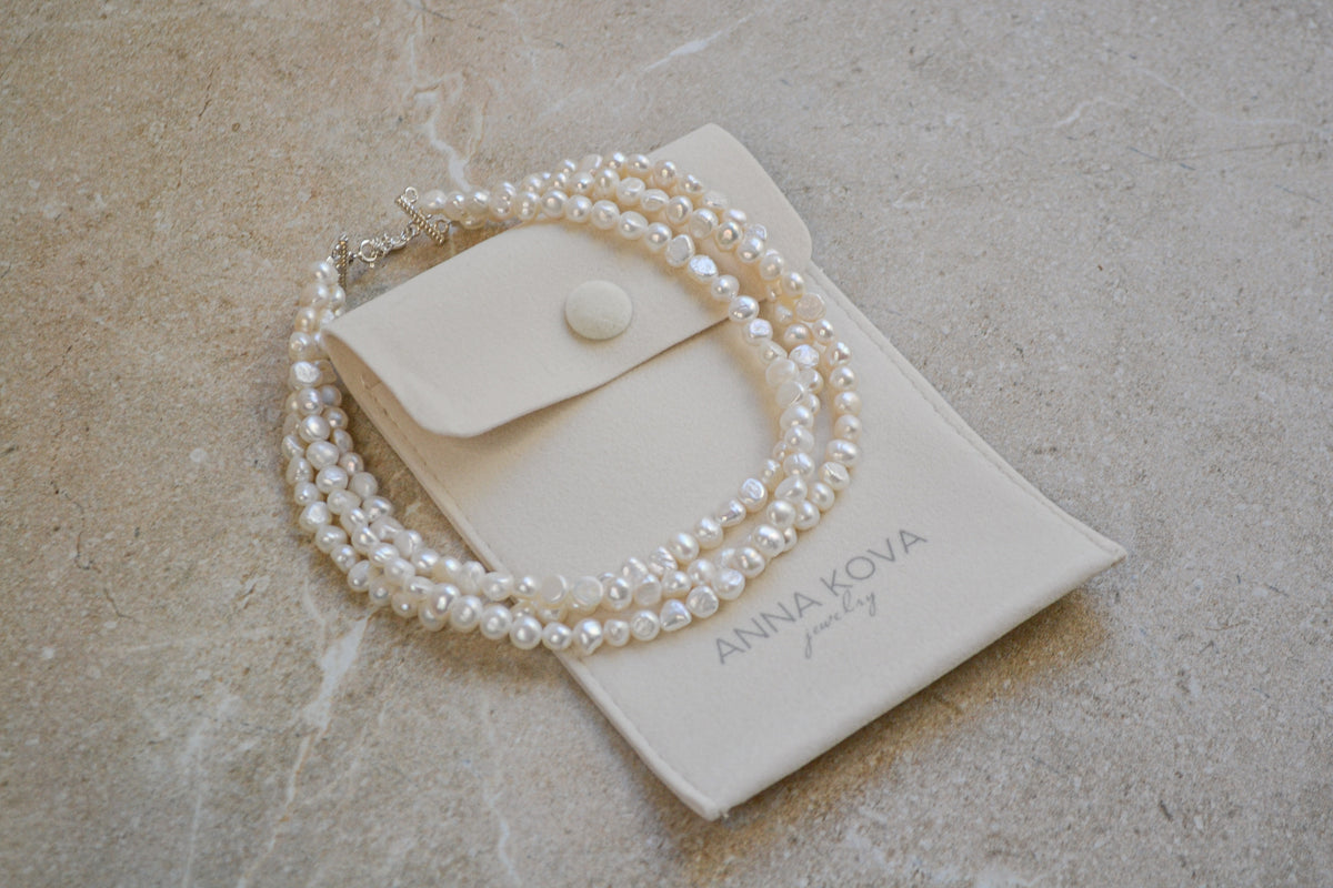 Detail of the layered natural pearls and silver hardware on the TOCCOA necklace