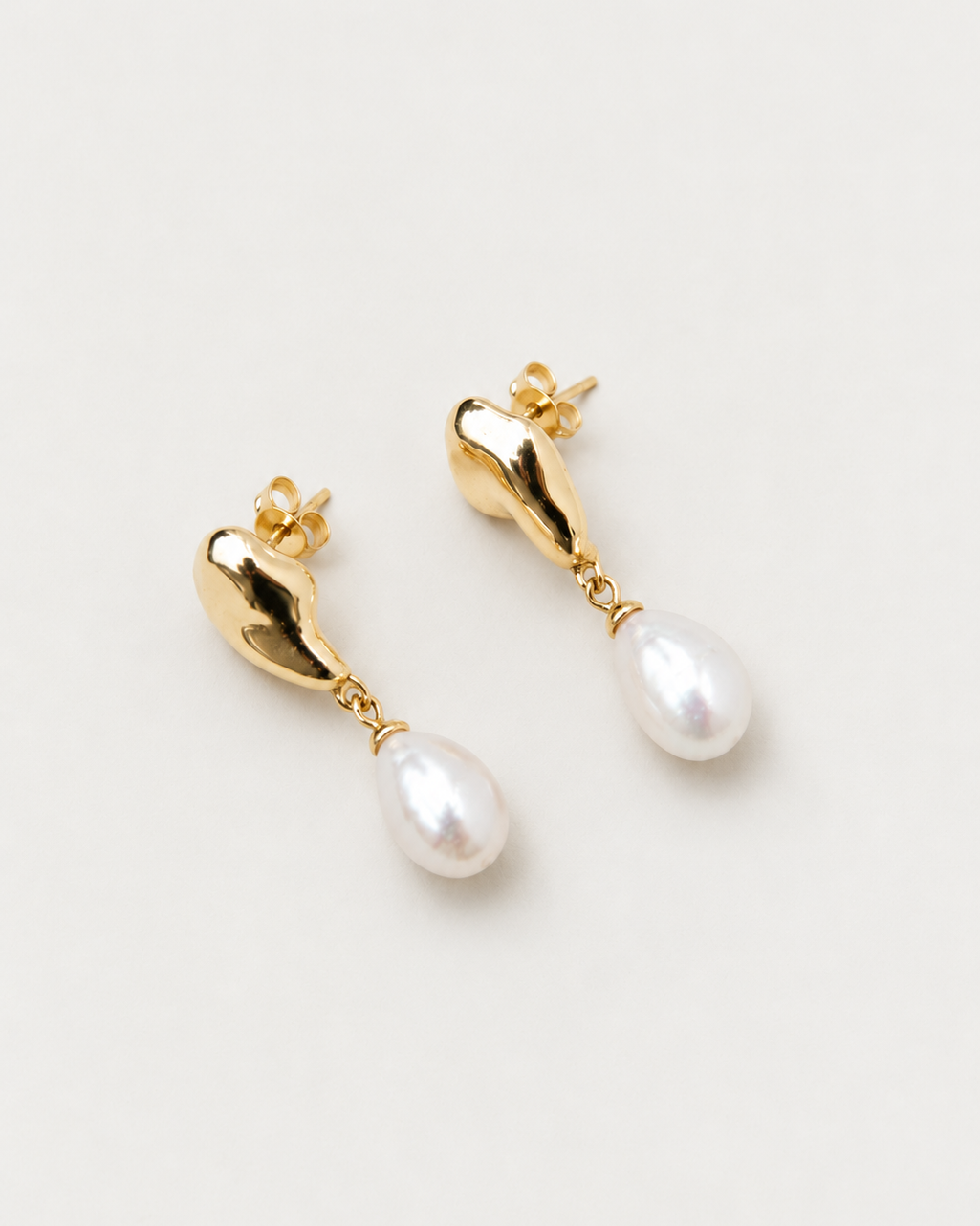 Dew gold-plated sterling silver pearl drop earrings with polished sculptural details