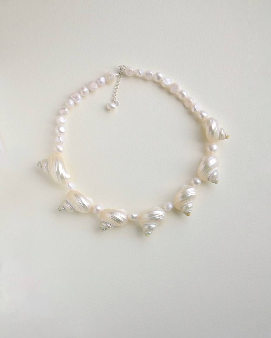 SirenCore pearl choker featuring seven ocean shells and sterling silver details
