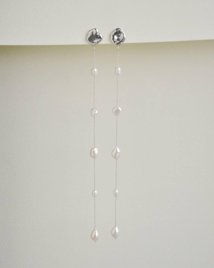 Fonte long sterling silver earrings with five freeform pearls, 15 cm long