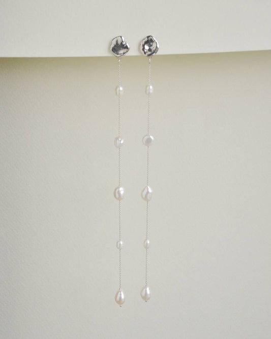 Fonte long sterling silver earrings with five freeform pearls, 15 cm long