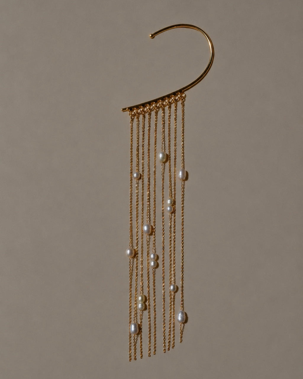 Gold-plated Malta pearl ear cuff with cascading natural pearls