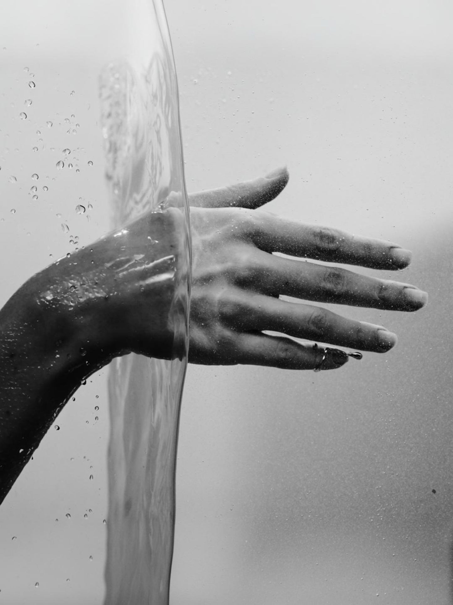 handcrafted fluid silver ring worn on fingertip fashion styling