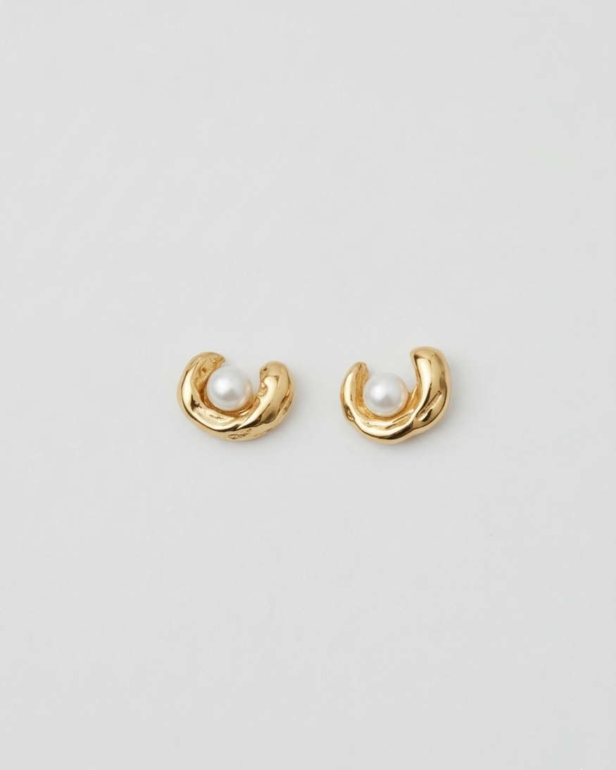 gold plated pearl stud earrings small sculptural design