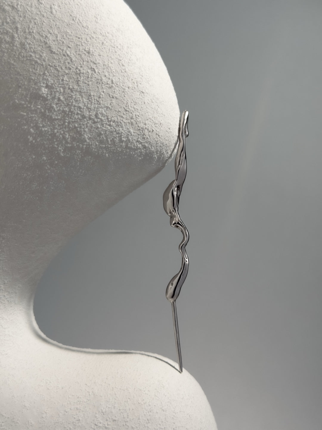 Sculptural sterling silver ear cuff earring, fluid organic shape mono earring, minimalist modern jewelry design
